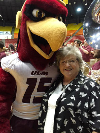 Teresa Hibbets with the ULM mascot